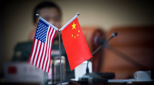 中美贸易谈判本质上是一场政治较量。图片来源:人民日报