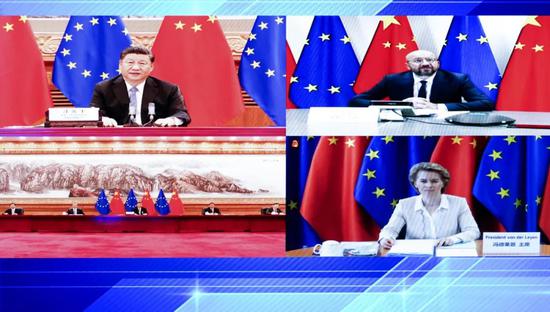 6月22日,习近平在北京以视频方式会见欧洲理事会主席和欧盟委员会主席(图源:新华社)