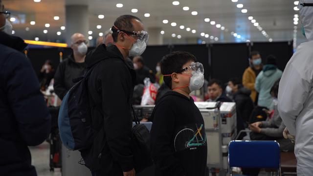 境外回国人员新冠肺炎就诊费用怎么算？京沪明确了