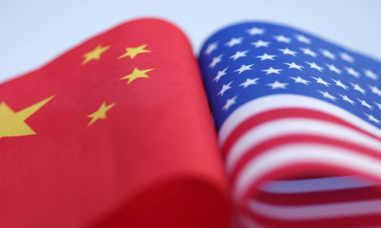 &ldquo;危机预言家&rdquo;拉詹呼吁美国取消对华关税以帮助抗疫