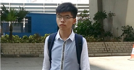 黄之锋公开记者资料还煽动网友滋扰 专家：涉嫌违法