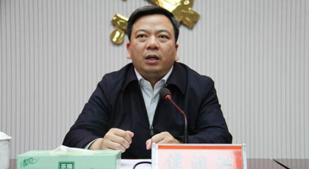 攸县原县委书记谭润洪被控受贿 一审获刑15年